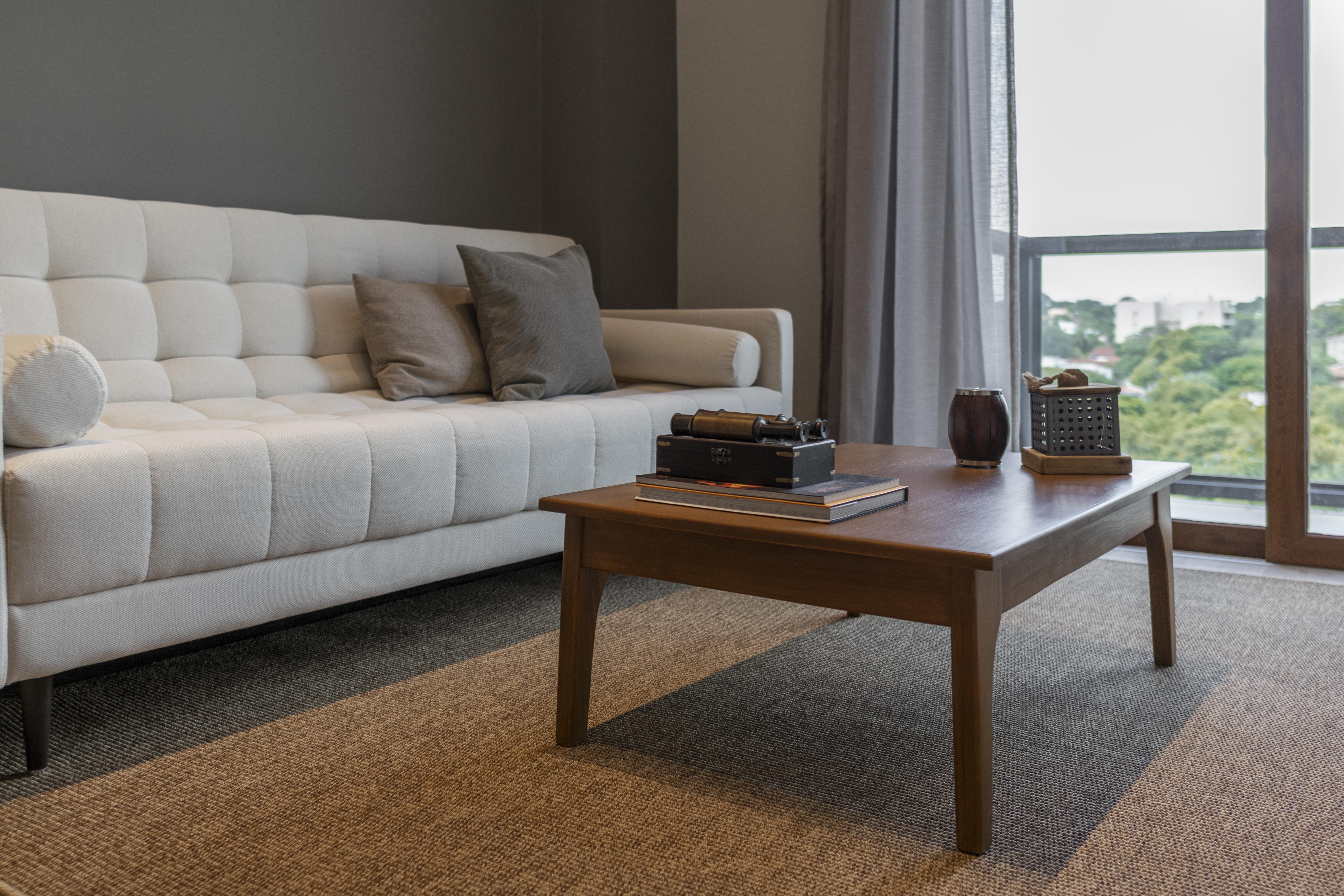 Five Hotel & Residences Asunción Exterior foto A coffee table in a living room